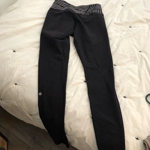 Black lululemon leggings with stiripey top band